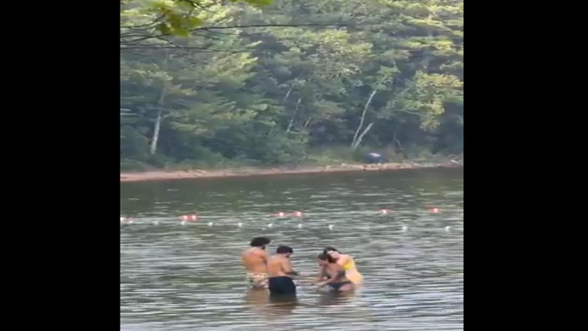 Viral video of couple bathing in Canadian lake sparks outrage online | Video