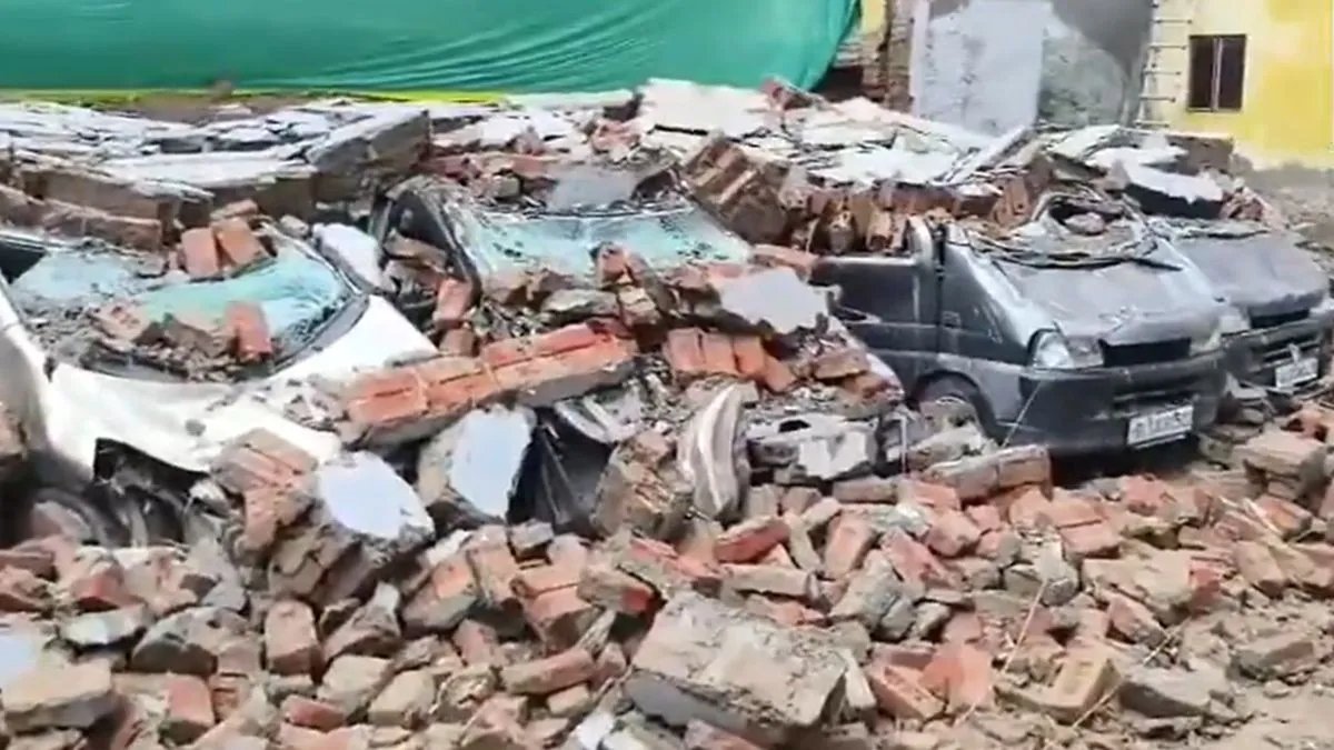 Delhi rain turns chaotic as 8 cars damaged after parking lot wall collapses amid heavy downpour in Deoli