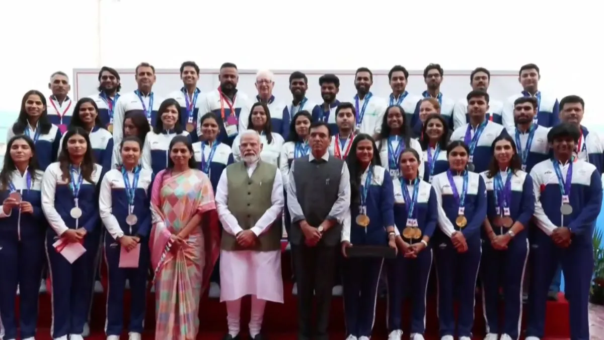 PM Modi felicitates Asian Games medal winners, receives signed jerseys and hockey stick from athletes